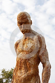 Silhouette of a human statue of stone