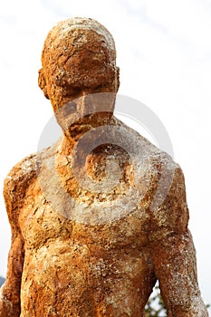 Silhouette of a human statue of stone