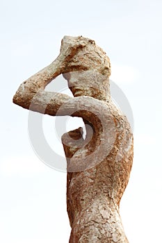 Silhouette of a human statue of stone