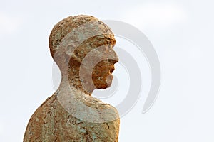 Silhouette of a human statue of stone