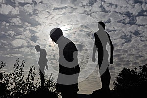 Silhouette of human statues of stone