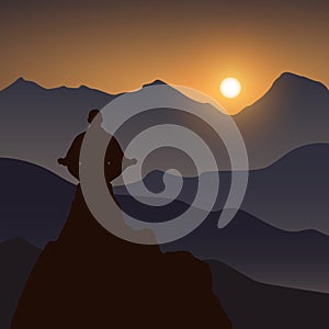 Silhouette of human, who meditate on a cliff