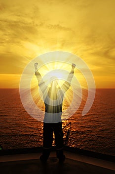 Silhouette Image of Man Raising His Hands