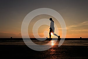 Silhouette Image of man walking on the helideck