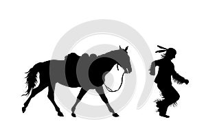 Silhouette of indian running with a horse