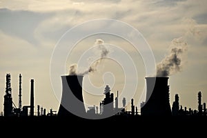 Silhouette of industrial chimneys