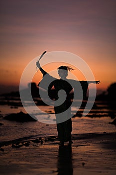 Silhouette of Japanese Geisha in kimono with fan