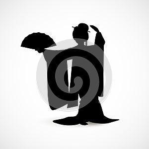 Silhouette of Japanese woman dressed in traditional kimono costume dancing with a fan isolated on white background