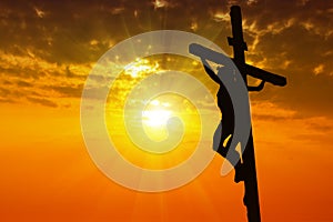 Silhouette Jesus Christ crucifixion on cross