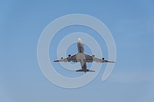 Silhouette of jet taking off into the skies