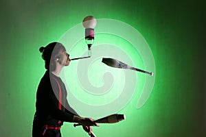 Silhouette of a juggler