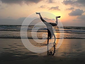 Silhouette of kid on the beach