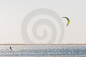 Silhouette of kite surfer on the lagoon at Walvis Bay