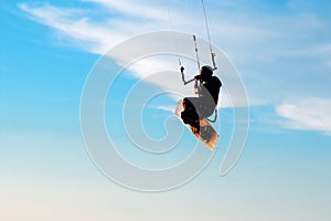 Silhouette of a kitesurfer