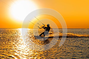 Silhouette of a kitesurfer