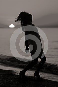 Silhouette of a lady dancing