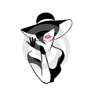Silhouette of a lady in a hat