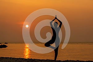 Silhouette lifestyle woman yoga exercise for healthy life.