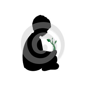 Silhouette little baby boy sitting guarding plant sprout