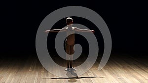 Silhouette of little girl ballerina on stage in darkness, slow motion.