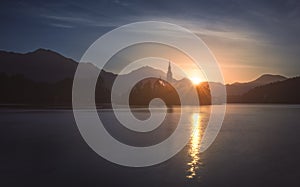 Silhouette of Little Island with Catholic Church in Bled Lake, S