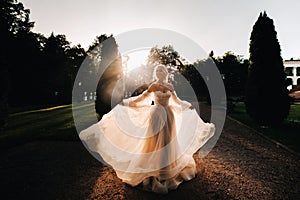 Silhouette of The lonely bride in the vintage At sunset