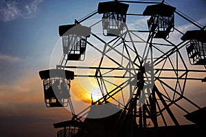 Silhouette Of Lover In The Ferris Wheel In The Evening