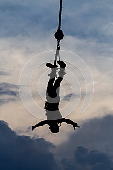 Silhouette of a male Bungee Jumper