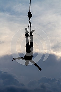 Silhouette of a male Bungee Jumper