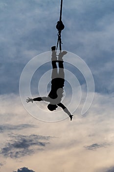 Silhouette of a male Bungee Jumper