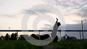 silhouette of male warrior with side stance movement