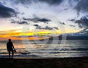 Man on Beach Silhouette Tropical Island Sunset Background