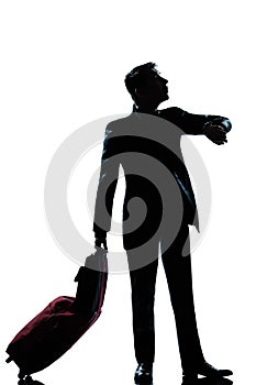 Silhouette man business traveler man checking the time