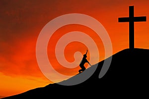 Silhouette of man with the Cross