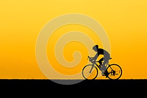 A Silhouette of man cycling