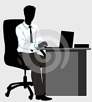Silhouette man at the Desk with laptop