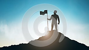 Silhouette of man with flag on mountain top over sky