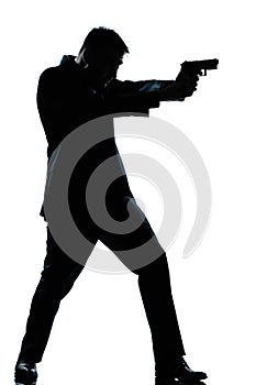 Silhouette man full length shooting with gun