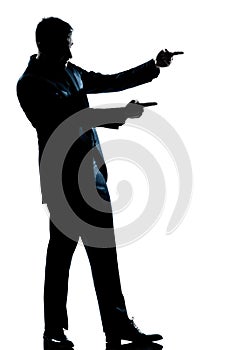 Silhouette man full length showing pointing
