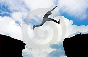 Silhouette of man jumping