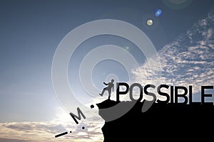 Silhouette man kicking alphabet from cliff to change impossible to possible with cloud blue sky , Positive mindset concept