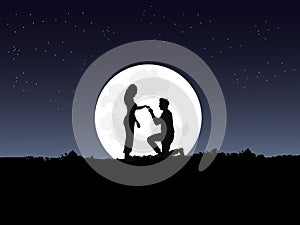 silhouette of a man kneeling to a woman on top of a mountain with the moon and blue sky as a background
