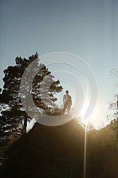 Silhouette of a man on a mountain