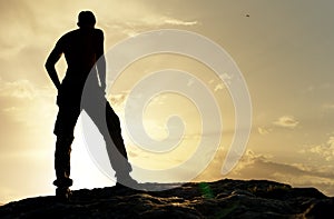 Silhouette of man in mountain.