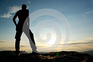 Silhouette of man in mountain.