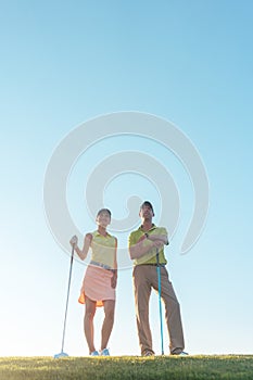 Silhouette of a man pointing while standing next to his partner