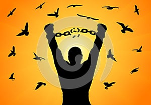 Silhouette of man with raised hands, breaking chain in handscuffs, on background of sunrise and flying birds, concept of freedom.