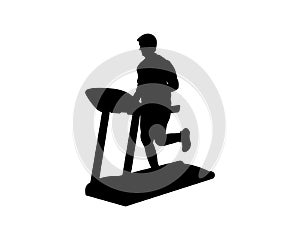 Silhouette of a man running on a treadmill