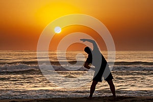 Silhouette Man Sea Sunrise Doing Fitness Exercise