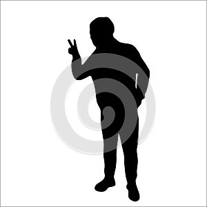 Silhouette man with showing his hand victory sign